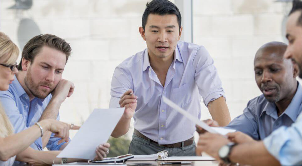 Diverse employees having a meeting